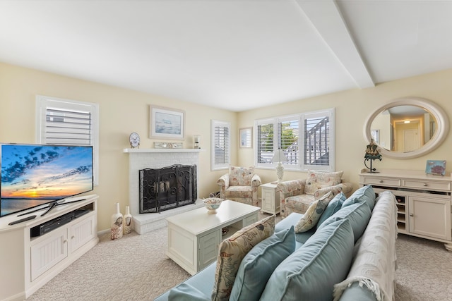 280 79th St Unit 4, Avalon, NJ 08202 - living room with light colored carpet, a brick fireplace, and beam ceiling