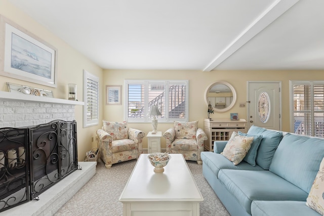280 79th St Unit 4, Avalon, NJ 08202 - living room featuring healthy amount of natural light, carpet flooring, beamed ceiling, and a brick fireplace