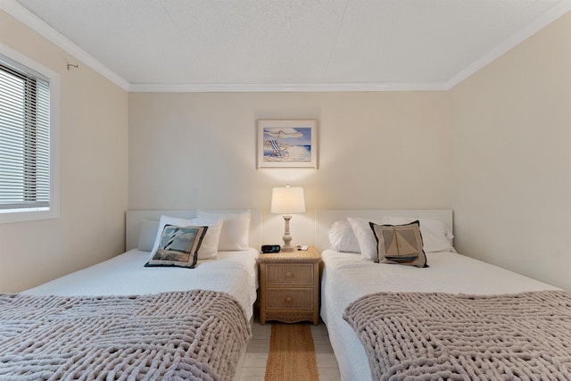 bedroom with ornamental molding