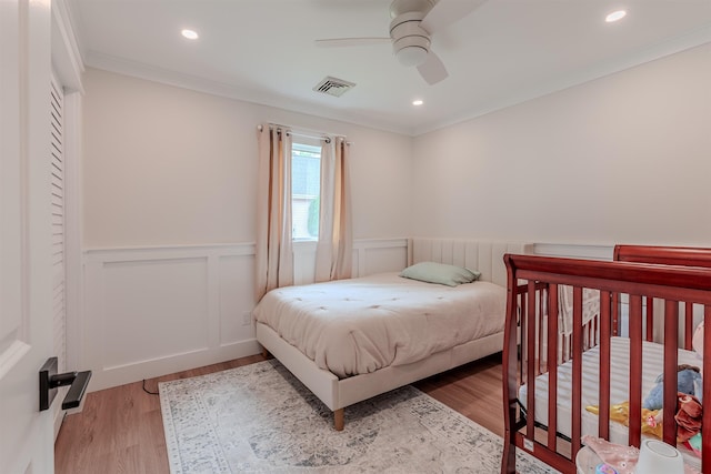 963 Tecumseh Rd, Erma, NJ 08204 - bedroom with a wainscoted wall, crown molding, wood finished floors, recessed lighting, and a ceiling fan