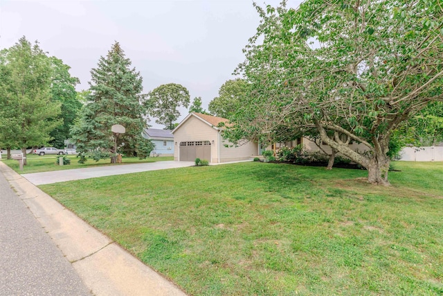 963 Tecumseh Rd, Erma, NJ 08204 - obstructed view of property featuring concrete driveway, a front lawn, and an attached garage