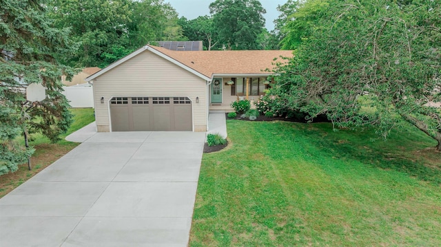 963 Tecumseh Rd, Erma, NJ 08204 - view of front of house with an attached garage, a front lawn, concrete driveway, and covered porch