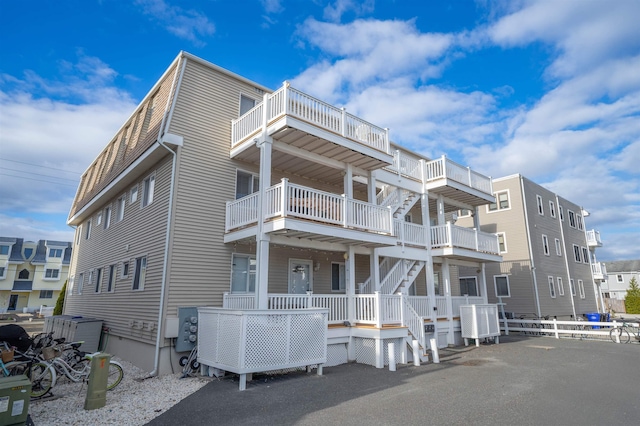 view of building exterior with central AC unit