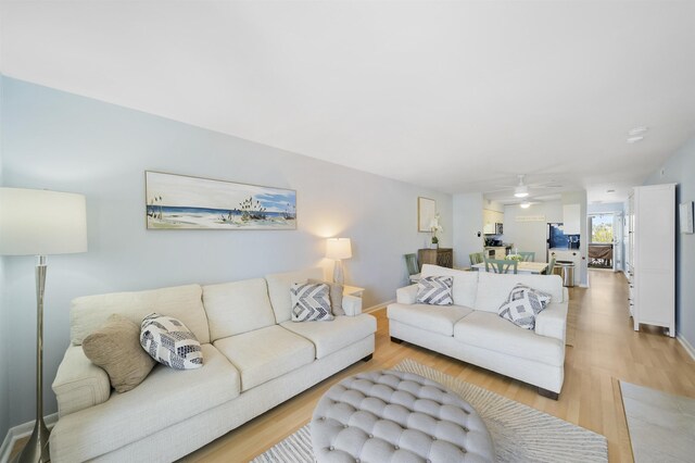 1607 Ocean Dr Unit E, Avalon, NJ 08202 - living room featuring light wood finished floors, ceiling fan, and baseboards