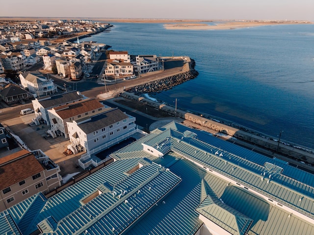 aerial view at dusk with a water view