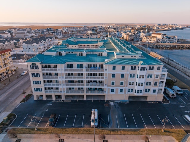 aerial view at dusk with a water view