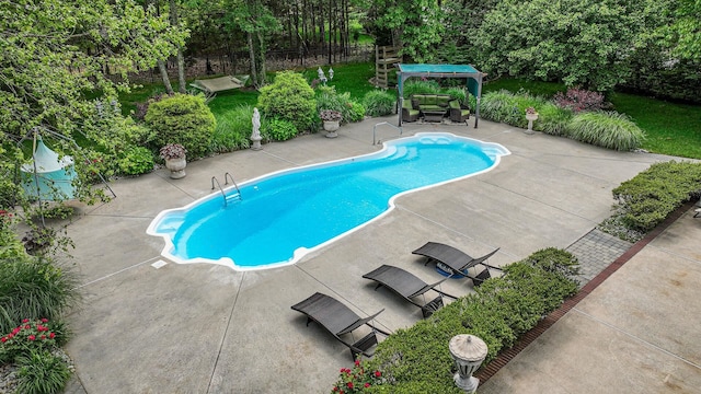 view of pool with a patio area