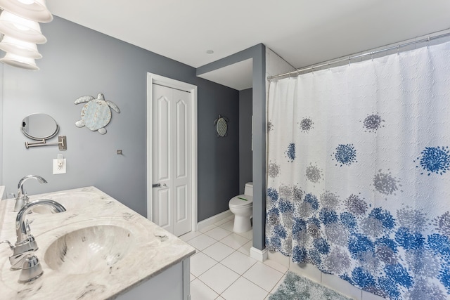 415 E Heather Rd Unit 202, Wildwood Crest, NJ 08260 - bathroom with tile patterned flooring, toilet, double vanity, a shower with shower curtain, and baseboards