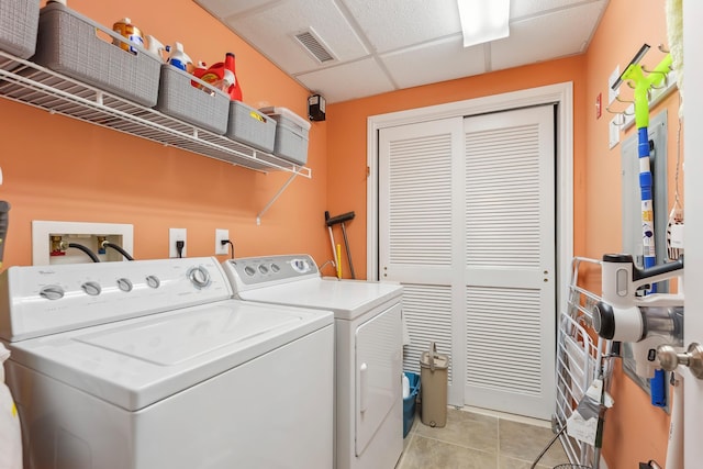 415 E Heather Rd Unit 202, Wildwood Crest, NJ 08260 - laundry area featuring washer and clothes dryer and light tile patterned flooring