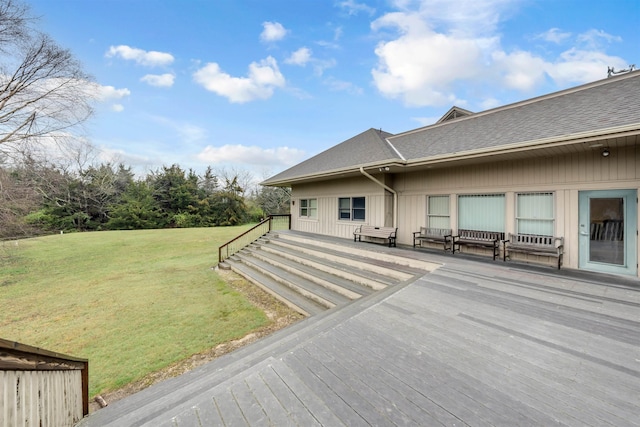 exterior space with a lawn and a deck