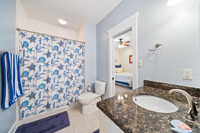 bathroom featuring vanity, tile patterned floors, a shower with shower curtain, ceiling fan, and toilet