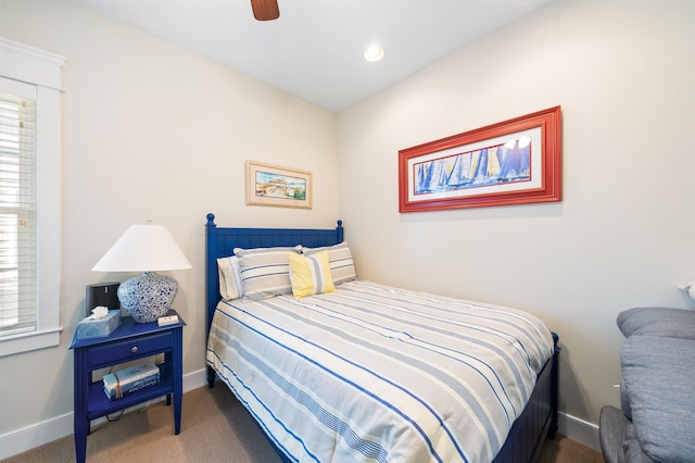 carpeted bedroom with ceiling fan