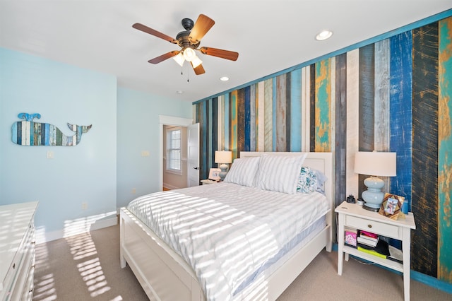 carpeted bedroom with ceiling fan