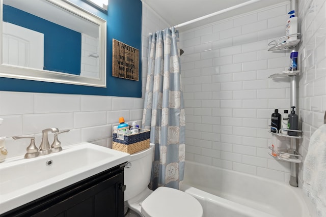 full bathroom featuring shower / bath combination with curtain, backsplash, vanity, tile walls, and toilet