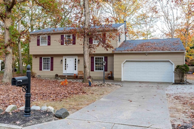 colonial-style house with a garage