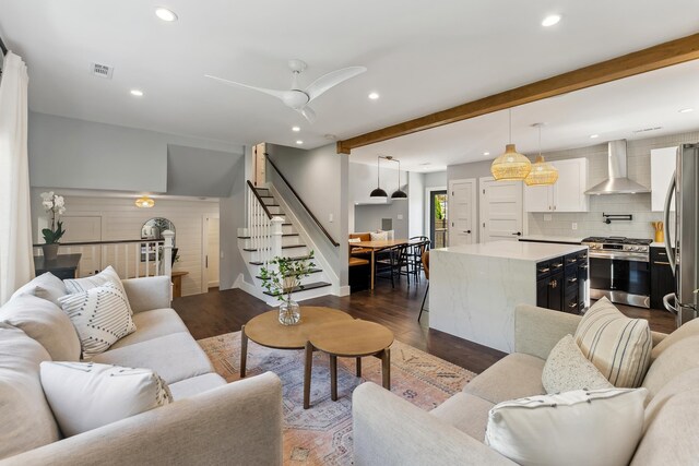 401 Fern Rd, Cape May Beach, NJ 08251 - living room with stairway, recessed lighting, dark wood-style floors, beamed ceiling, and a ceiling fan