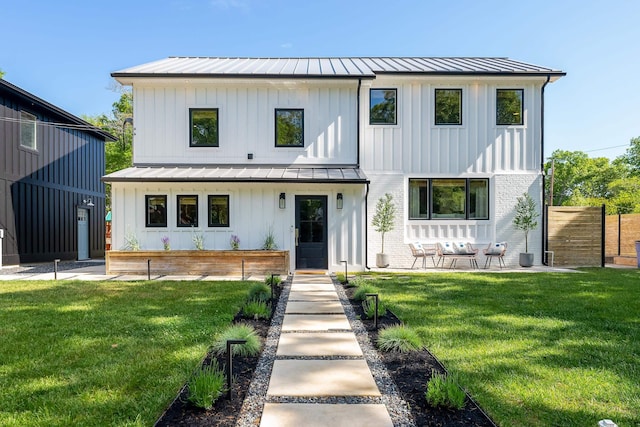 401 Fern Rd, Cape May Beach, NJ 08251 - modern farmhouse style home with a standing seam roof, board and batten siding, and metal roof