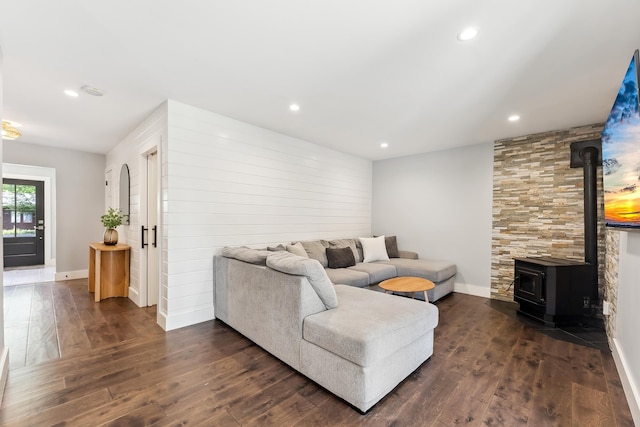 401 Fern Rd, Cape May Beach, NJ 08251 - living room with dark wood-style flooring, a wood stove, recessed lighting, and baseboards