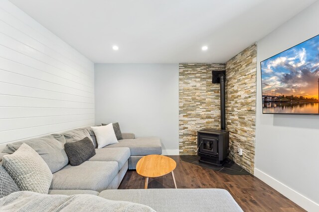 401 Fern Rd, Cape May Beach, NJ 08251 - living area with a wood stove, wood finished floors, baseboards, and recessed lighting