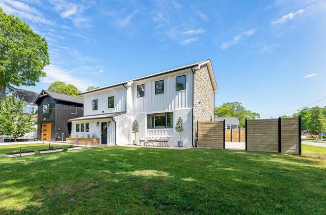 401 Fern Rd, Cape May Beach, NJ 08251 - view of front of house with board and batten siding and a patio