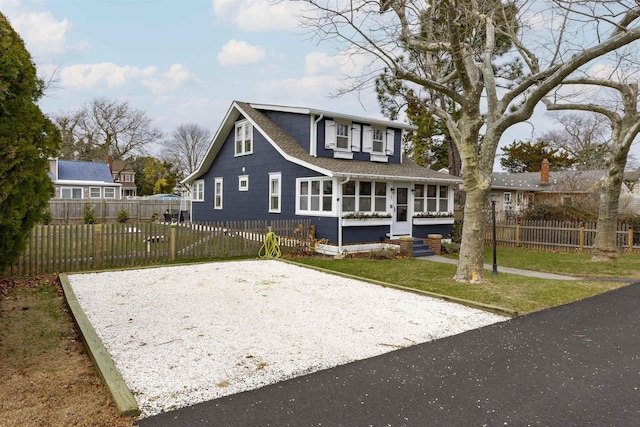 view of front of home with a front lawn