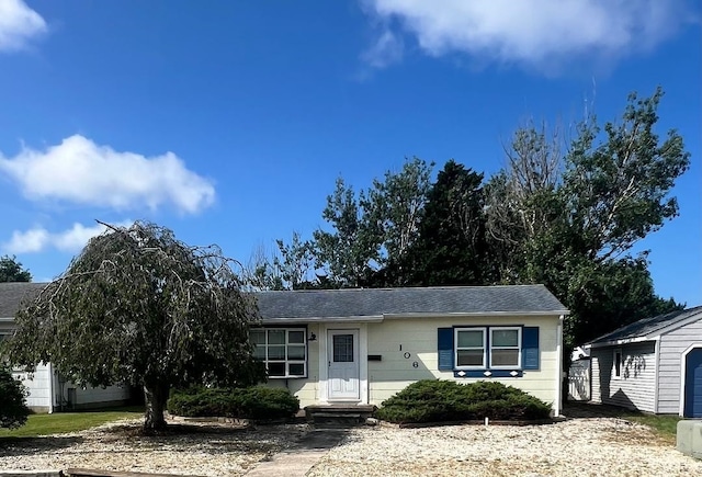 106 Cedardale Ave, Villas, NJ 08251 - view of front facade featuring a shingled roof and a garage