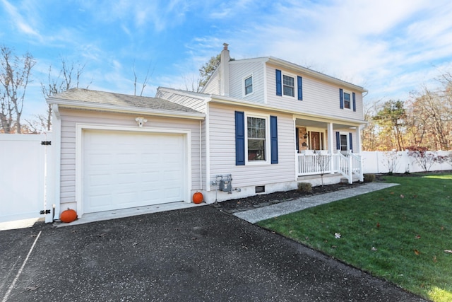 view of front facade with driveway, a porch, an attached garage, fence, and a front lawn