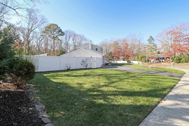 view of yard with fence