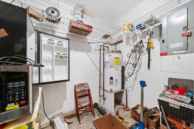 utility room featuring electric water heater and electric panel