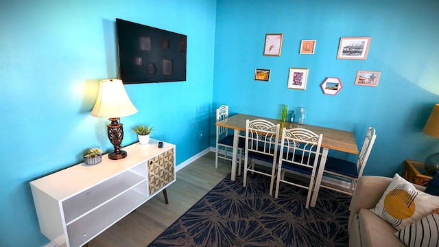 dining area featuring hardwood / wood-style floors