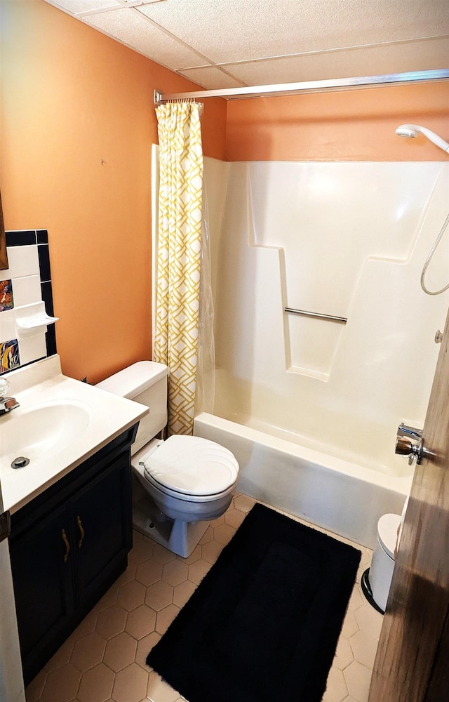 full bathroom with tile patterned floors, vanity, toilet, and shower / bathtub combination with curtain