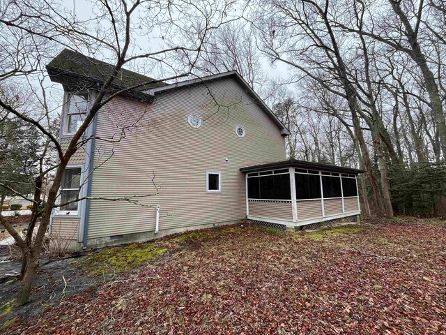 48 Secluded Ln, Rio Grande, NJ 08242 - view of side of property featuring a sunroom and crawl space