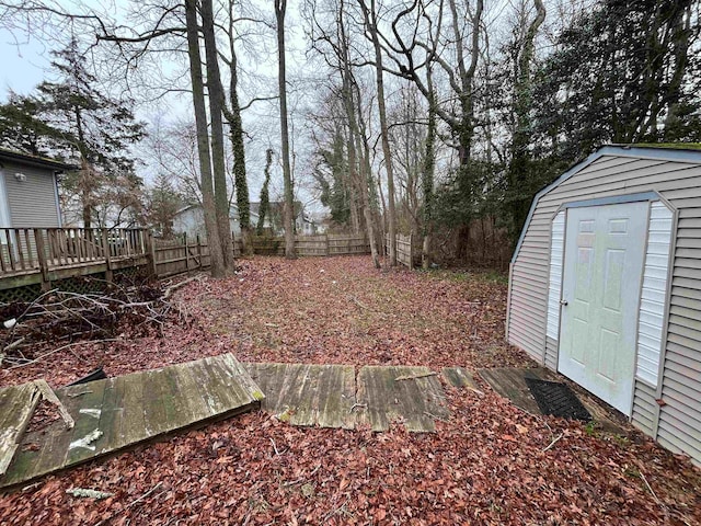 48 Secluded Ln, Rio Grande, NJ 08242 - fenced backyard featuring a shed, an outdoor structure, and a deck