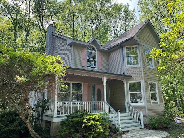 48 Secluded Ln, Rio Grande, NJ 08242 - victorian home with a porch and a chimney