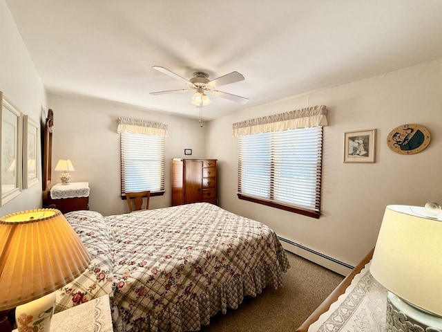 carpeted bedroom with ceiling fan, baseboard heating, and multiple windows