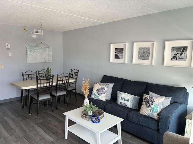 9101 Atlantic Ave Unit 303, Wildwood Crest, NJ 08260 - living room with wood finished floors and a textured ceiling