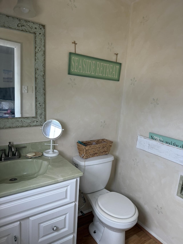 103 W Topeka Ave Unit 2, Wildwood Crest, NJ 08260 - bathroom with toilet, vanity, and wood finished floors