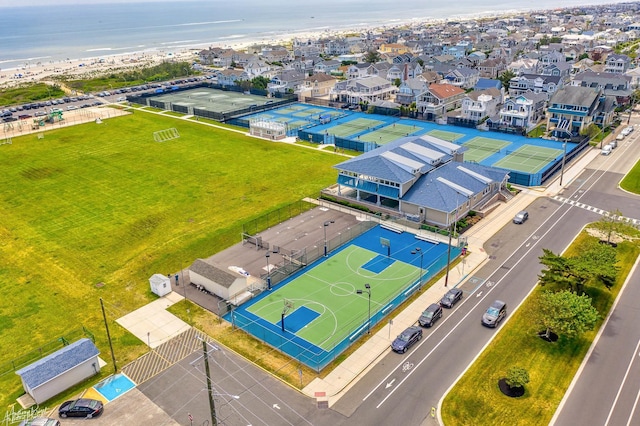 aerial view featuring a water view and a view of the beach