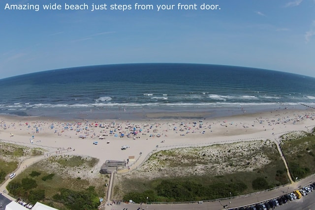 property view of water featuring a view of the beach