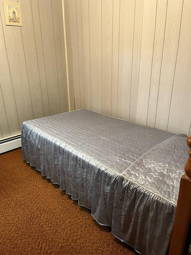 149 E Florida Ave, Villas, NJ 08251 - carpeted bedroom featuring wooden walls and a baseboard radiator