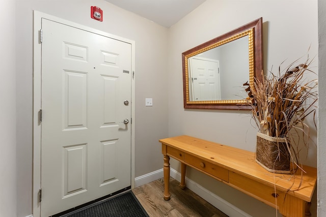 doorway to outside with hardwood / wood-style floors