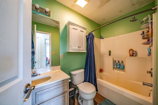 full bathroom featuring vanity, toilet, and shower / tub combo with curtain