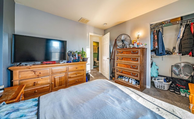 carpeted bedroom with a closet