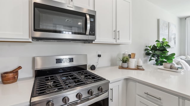 212 Bentz Ave, Villas, NJ 08251 - kitchen featuring appliances with stainless steel finishes, white cabinets, and light countertops