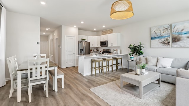 212 Bentz Ave, Villas, NJ 08251 - living room featuring light wood-style flooring, recessed lighting, and baseboards