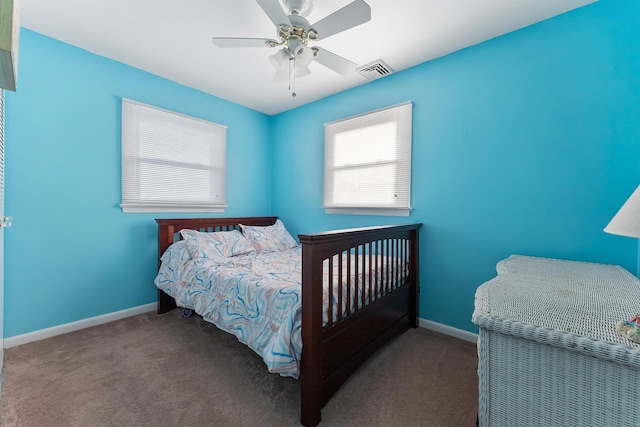 bedroom with ceiling fan and carpet floors