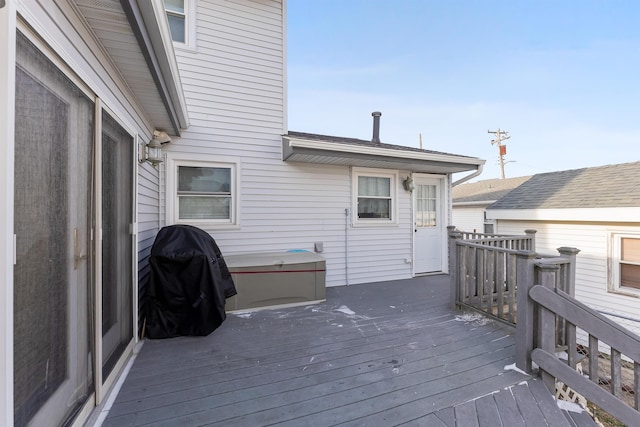 wooden deck featuring grilling area