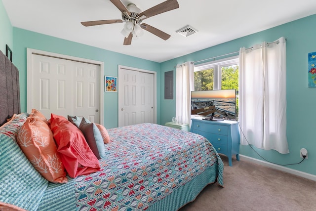 25 N 12th St, Del Haven, NJ 08251 - carpeted bedroom with multiple closets, electric panel, baseboards, and a ceiling fan