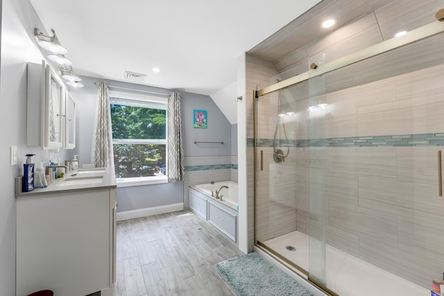 25 N 12th St, Del Haven, NJ 08251 - bathroom featuring vanity, a garden tub, a stall shower, recessed lighting, and lofted ceiling