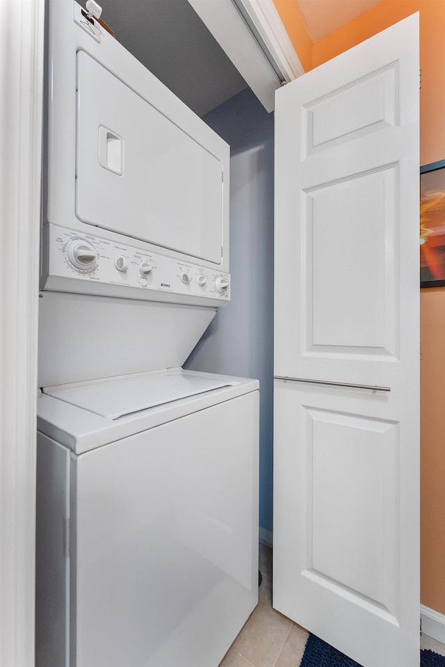 25 N 12th St, Del Haven, NJ 08251 - laundry area featuring stacked washing machine and dryer and light tile patterned floors